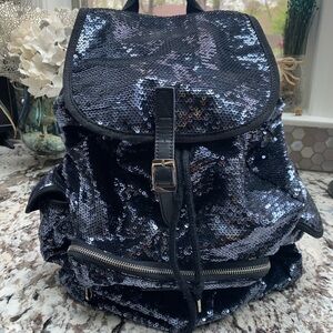 Victoria Secret blue sequence/black piping back pack.